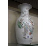 A Chinese porcelain baluster vase, with five figures before a tree, 42cm high