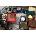 A quantity of sporting medals, boxed and a collection of fashion watches