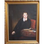 A modern oil on canvas, portrait of a young boy seated with books, unsigned, 63.5cm x 49cm