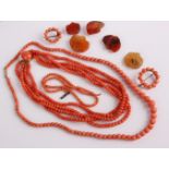 Assorted coral necklaces to include a graduated necklace with 9ct gold clasp, a four strand