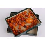 Assorted butterscotch amber graduated beads, 33g approx. amber coloured loose beads, plastic