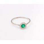 An art deco style emerald and diamond ring, white coloured metal shank, 2.5g in total