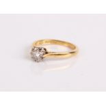 An 18ct gold and diamond solitaire ring, the diamond 3mm in diameter approx. 2.4g in total