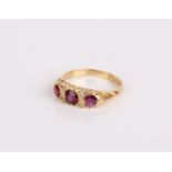 An 18ct gold, ruby and diamond ring, 3.8g in total