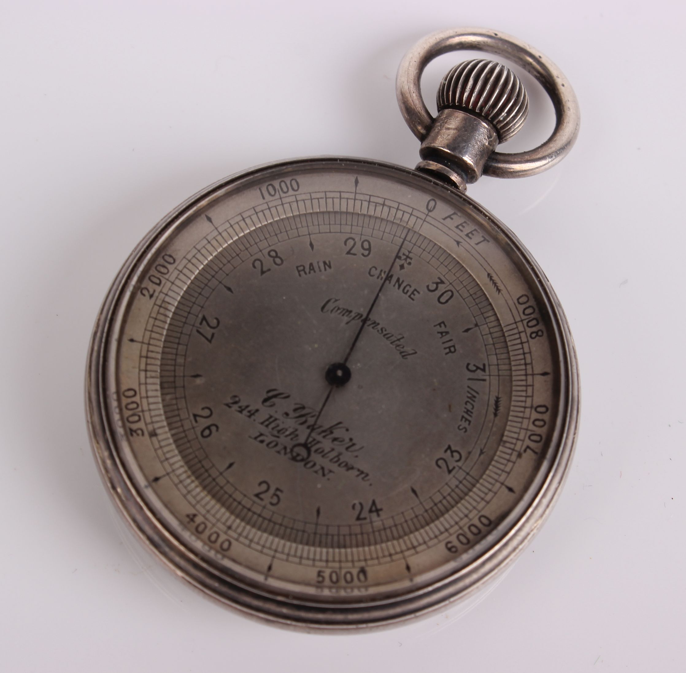 A silver cased Victorian pocket barometer, with adjustable altimeter made be C.Baker 244 High
