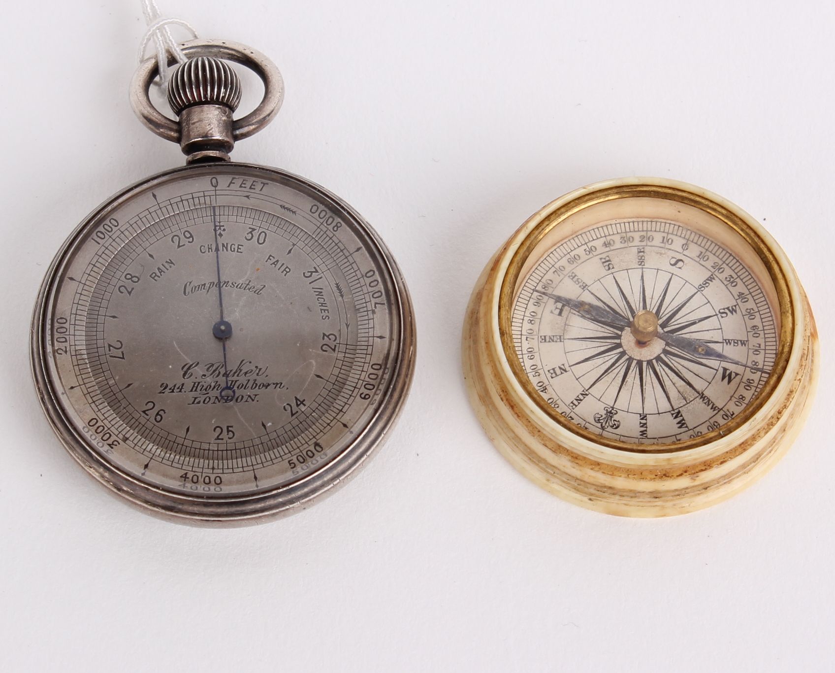 A silver cased Victorian pocket barometer, with adjustable altimeter made be C.Baker 244 High - Image 2 of 3