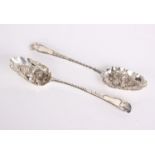 A pair of 18th Century silver spoons with later Victorian decoration, London one with makers marks