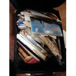 A large quantity of theatre programmes, calendars and photographs in a suitcase