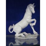 Lladro Privilege Magical Unicorn, model number 7697, 21cm high approx.