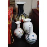 A group of Modern Oriental ceramic vases, in boxes