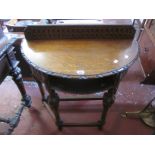 An Edwardian mahogany pedestal desk 118cm wide, nest of three table and an Edwardian oak demi lune