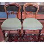 A matched set of five Victorian mahogany balloon back chairs and an additional 19th Century mahogany