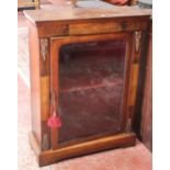 A Victorian walnut, inlaid and mounted pier cabinet the glazed door enclosing a shelf 102cm high,