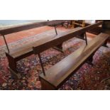 A pair of stained pine benches 290cm length