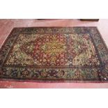 A Middle Eastern design carpet 220 x 125cm