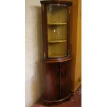 A 20th Century mahogany glazed corner cabinet and 19th Century mahogany drop leaf table