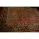 A Sarouk carpet worn 420 x 320cm