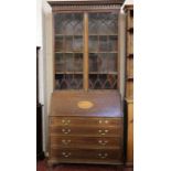 A George III style mahogany bureau bookcase late 19th Century, the arcaded cornice above 'gothic'