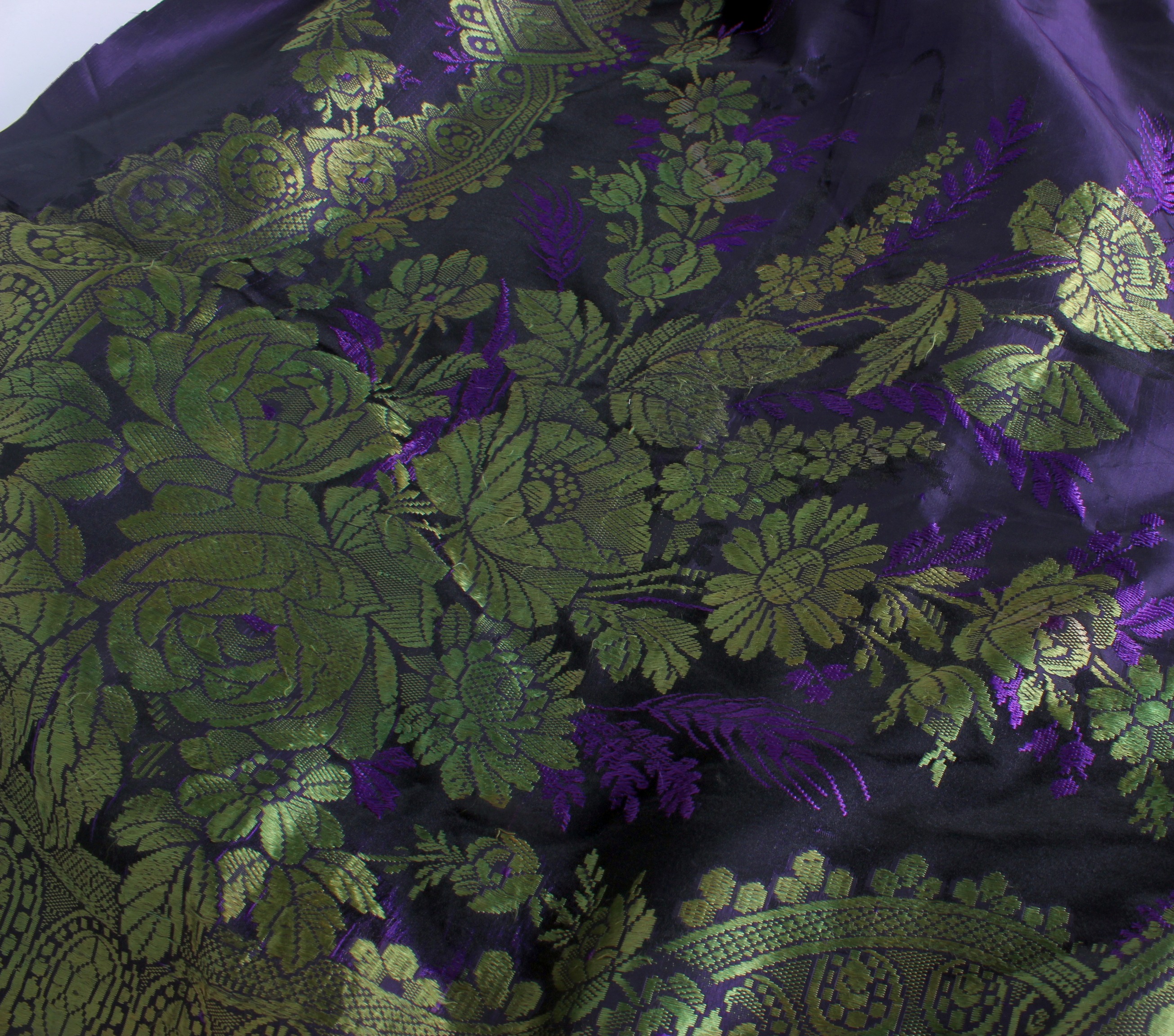 A late 19th Century floral silk skirt; a panel of 19th Century mauve silk (with damage), a white - Image 12 of 12