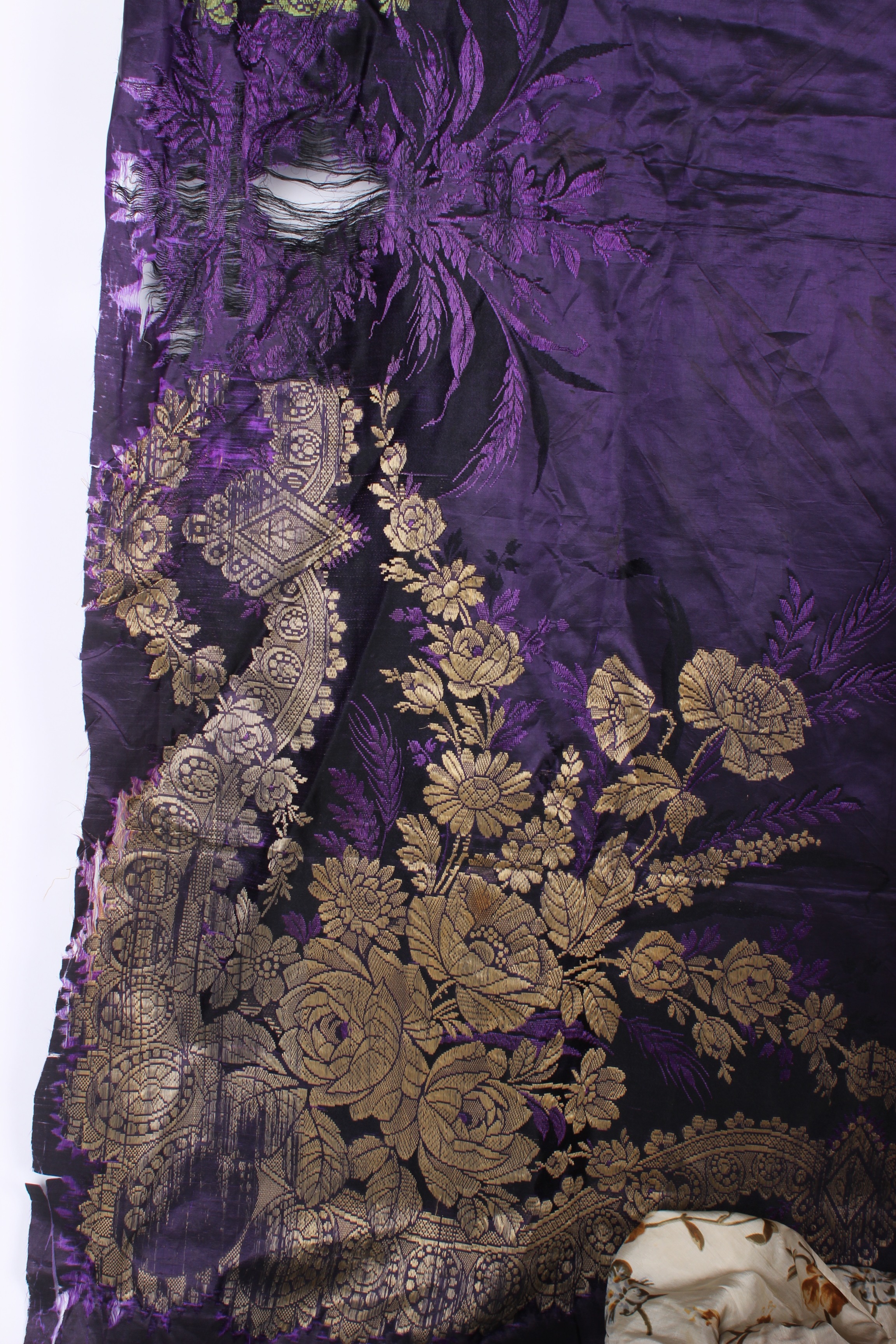 A late 19th Century floral silk skirt; a panel of 19th Century mauve silk (with damage), a white - Image 7 of 12