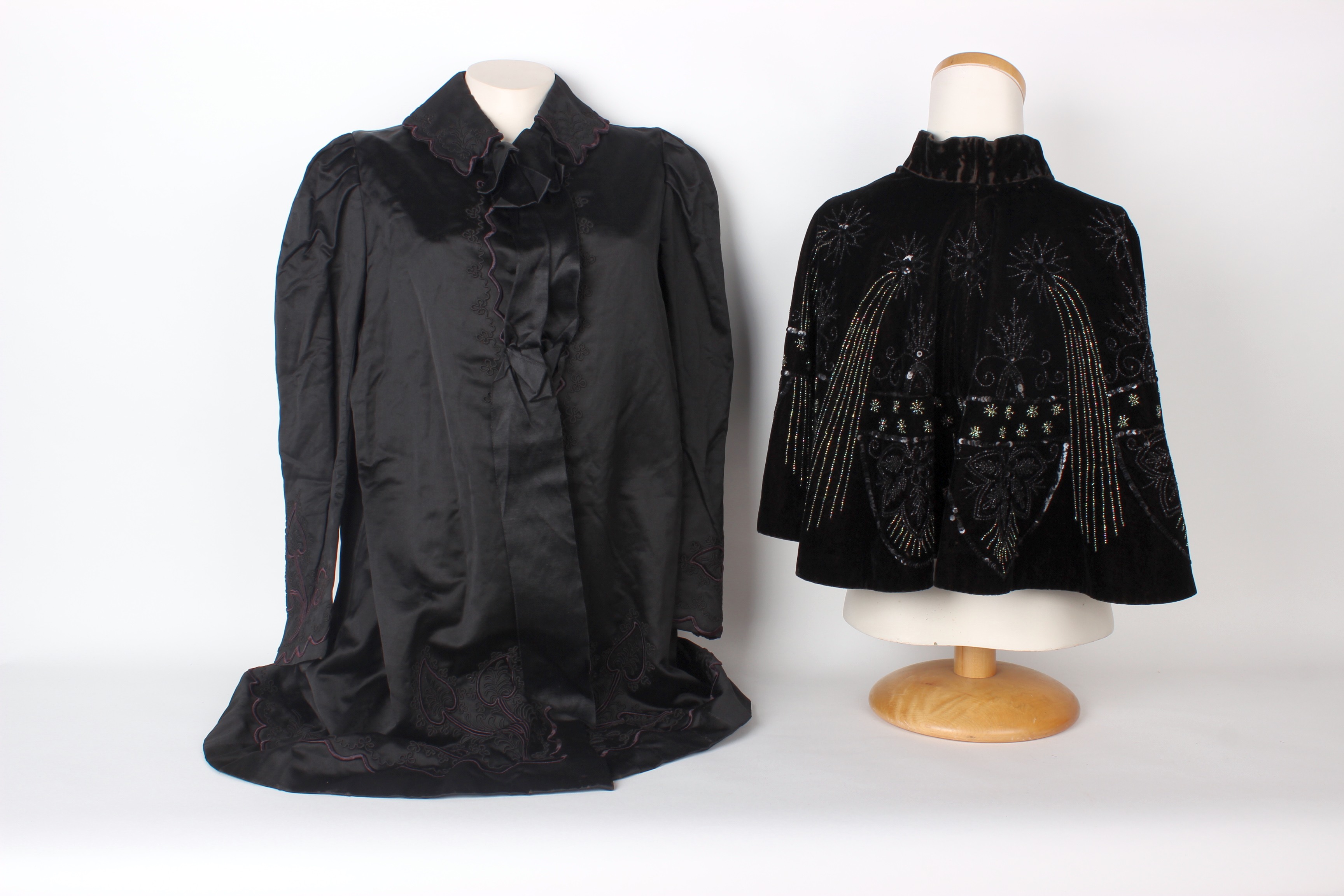 A late 19th Century black grosgrain jacket, a black satin Victorian jacket embellished with