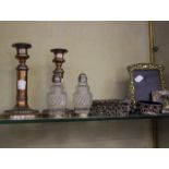 A pair of silver plated candlesticks, a pair of silver mounted sifters, and other silver and