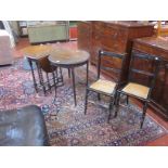 An Edwardian mahogany lamp table, to caned and ebonised chairs and an oak drop leaf table