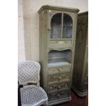 A pair of French style floral painted bedroom cabinets each with glazed cupboard and short drawers