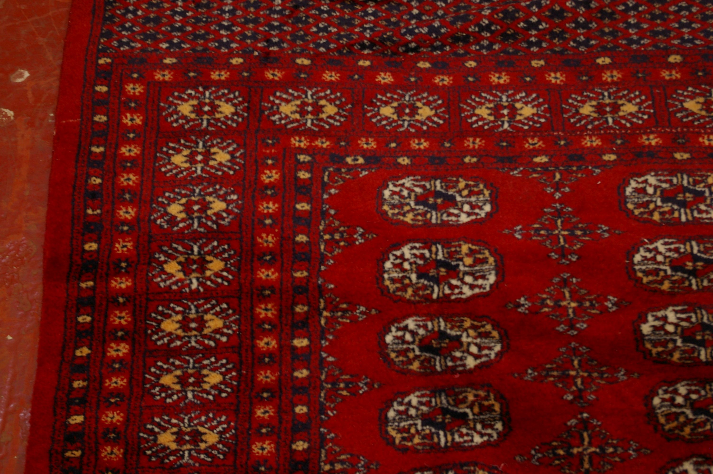 A Pakistan Bokhara carpet 310 x 100cm - Image 2 of 2