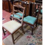 A pair of Chippendale style mahogany side chairs each with carved splat and cabriole legs on ball