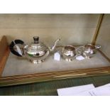 A three piece tea service each with ribbed design and sectional handles G.Bryan & Co, Birmingham,