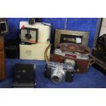 A group of mixed vintage cameras