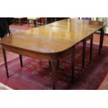A 19th Century mahogany extending dining table with D ends and square section tapering legs 243cm