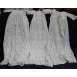 Thirteen late Victorian/Edwardian christening robes and a cream and brown 1970s brown and cream