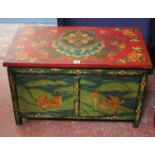 A South East Asian painted side cabinet 46cm high, 78cm wide