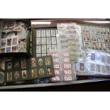 A quantity of cigarette cards loose in box and framed