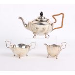 Silver: An early 20th C three piece tea service, by J Sherwood & Sons Birmingham 1912. 18 ozt or 578