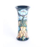 A Moorcroft pottery Collectors Club vase decorated in blue rhapsody pattern, printed marks, signed