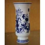 A blue and white floral decorated vase bearing Meissen cross swords mark and no.ed 50073 24cm high