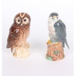 Tawny owl and peregrine falcon figurine whisky containers, made by Royal Doulton, for Whyte &