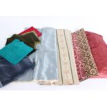 A quantity of upholstery and light upholstery weight fabrics; to include tweed, wool, brocade,
