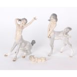 A Lladro Centaur girl and boy and reclining baby