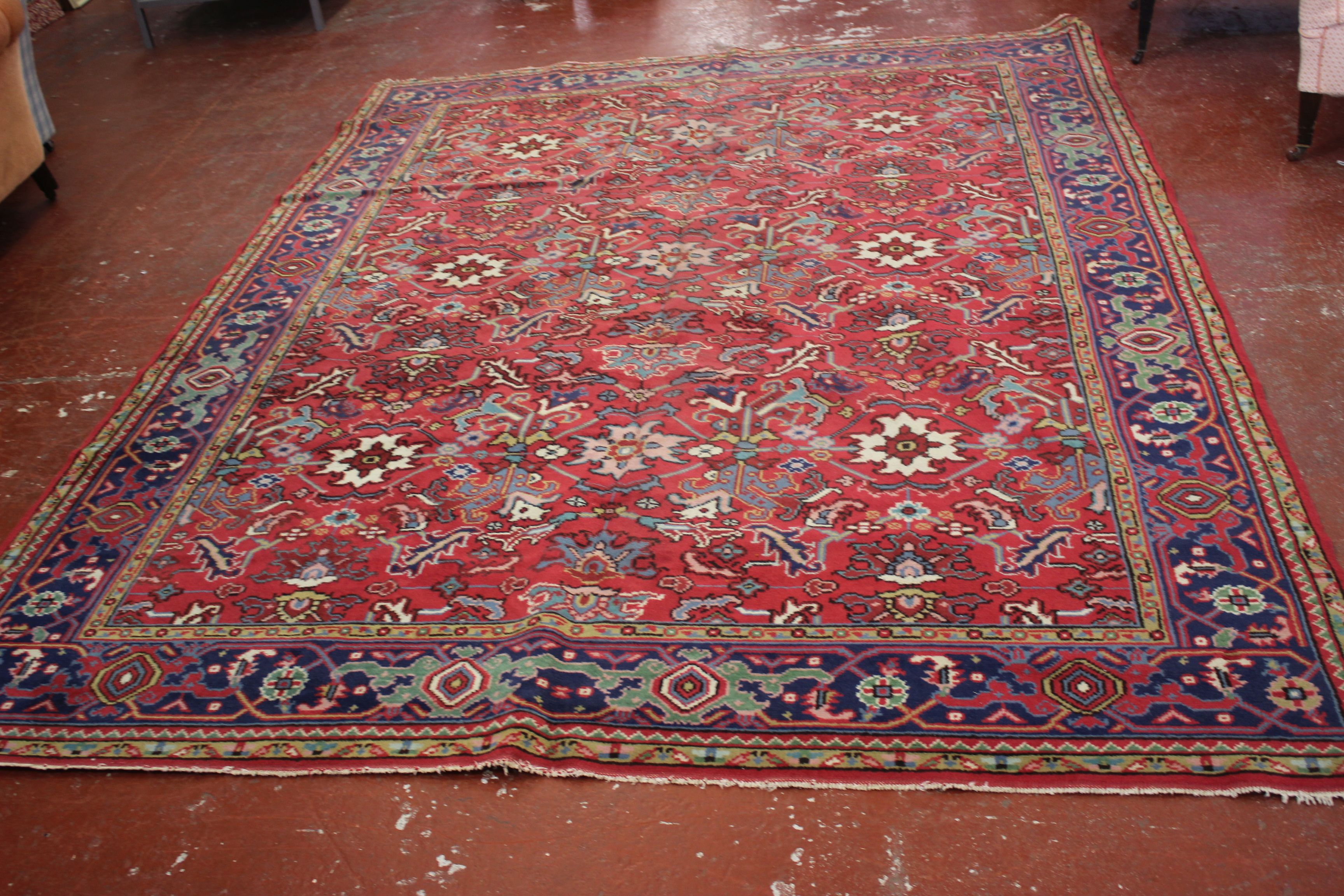 A Heriz carpet 255 x 340cm