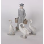 Three Lladro ducks and a Lladro a Dutch boy carrying milk (4)