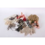 A collection of passementerie; Comprising, cream lace edging, silk and velvet flowers and leaves,