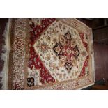 A beige ground Heriz carpet 280 x 200cm