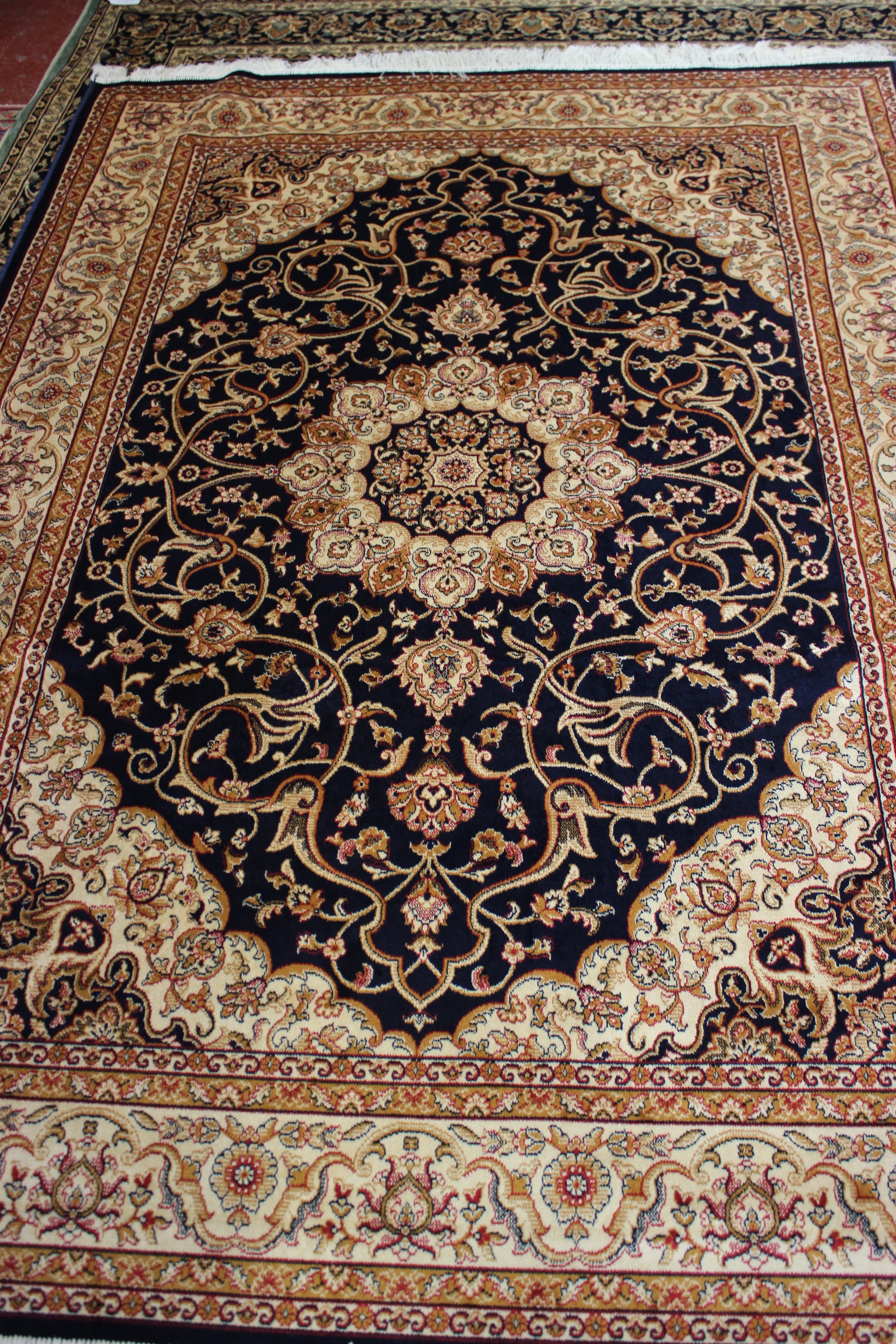 A blue ground Kashan carpet 230 x 160cm