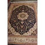 A blue ground Kashan carpet 230 x 160cm