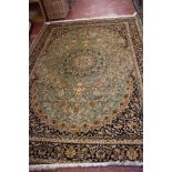 A green ground Kashan carpet 280 x 200cm