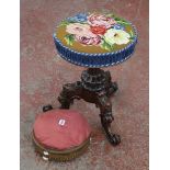A Victorian foot stool and a revolving piano stool with carved base and tapestry cover